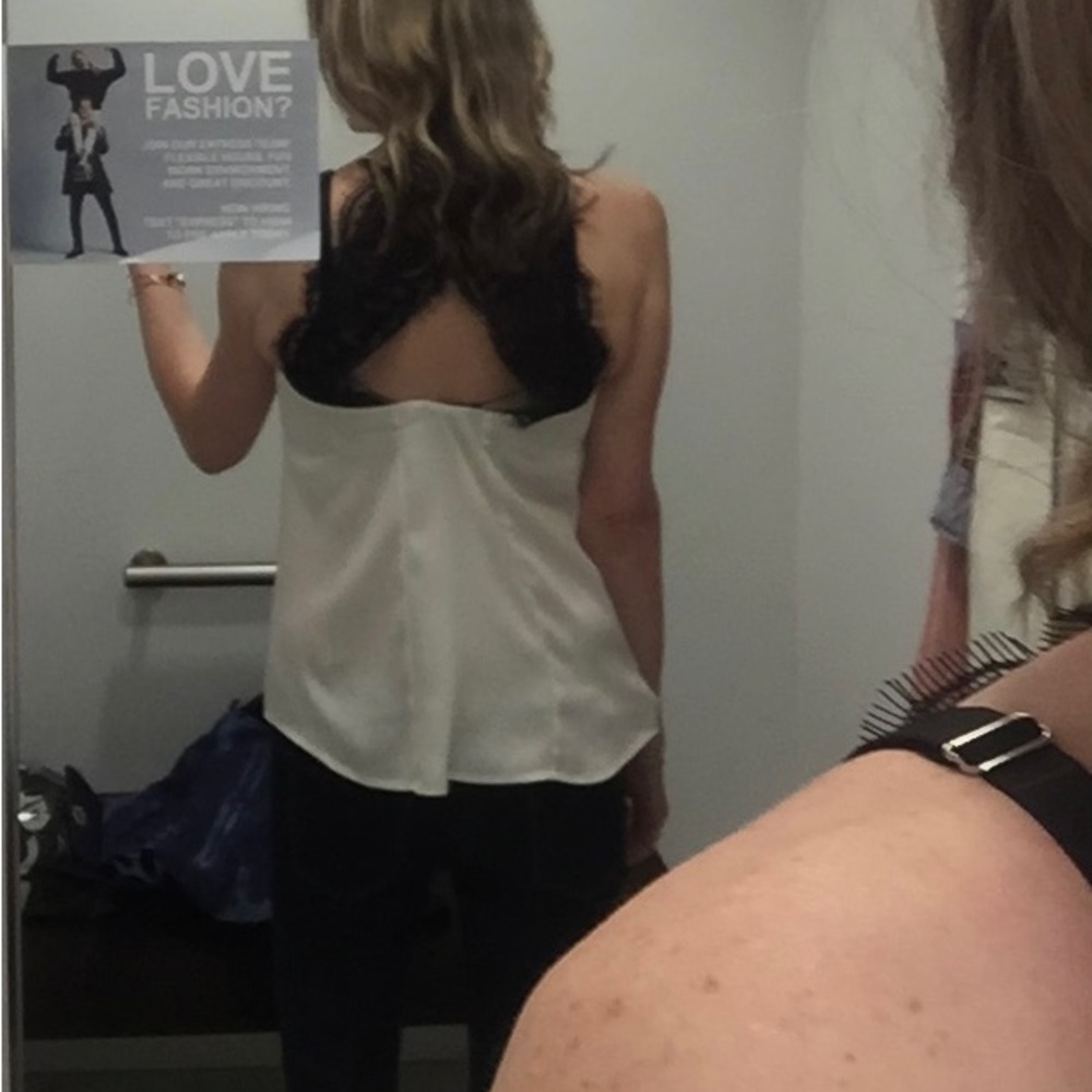 White halter neck blouse with black lace back detail